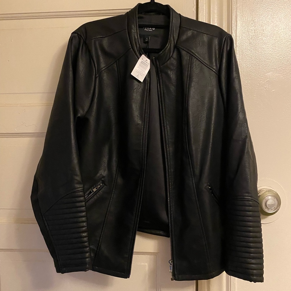 Brand new tags on leather jacket